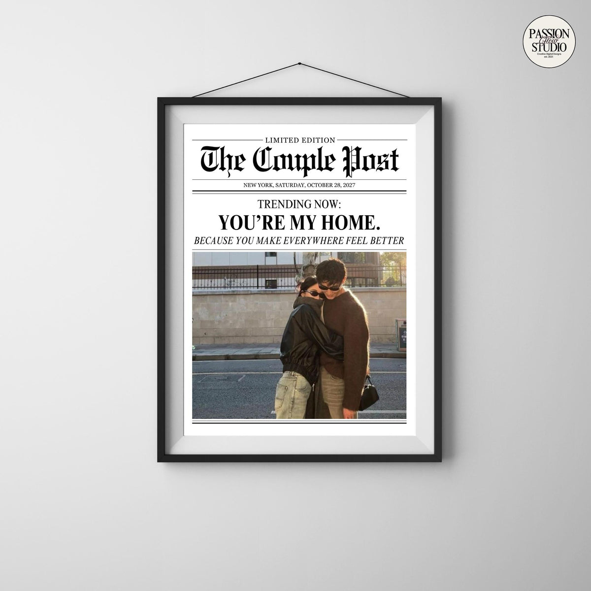 You're My Home newspaper print hanging on a wall